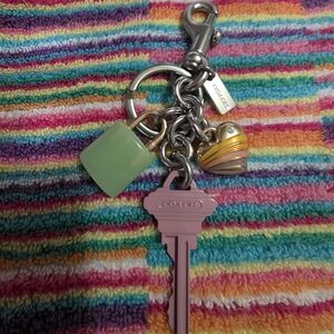 Coach Pink Key Charm with Green Lock and Yellow-Striped Heart